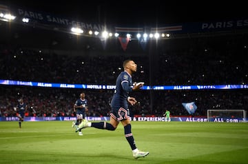 Paris Saint-Germain's French forward Kylian Mbappe celebrates his goal during the French L1 football match between Paris-Saint Germain (PSG) and Olympique Marseille (OM) at The Parc des Princes Stadium in Paris on April 17, 2022. (Photo by FRANCK FIFE / AFP)