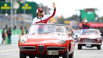 MONZA, ITALY - SEPTEMBER 08: Antonio Giovinazzi of Italy and Alfa Romeo Racing waves to the crowd on the drivers parade before the F1 Grand Prix of Italy at Autodromo di Monza on September 08, 2019 in Monza, Italy. (Photo by Mark Thompson/Getty Images)