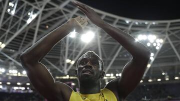 Jamaica&#039;s Usain Bolt applauds as he leaves the track after placing third in the men&#039;s 100m final during the World Athletics Championships in London Saturday, Aug. 5, 2017. (AP Photo/Matthias Schrader)