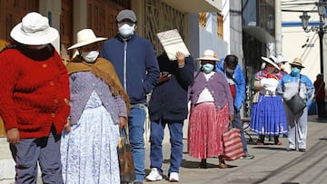 People in the Andean city of Puno, close to the border with Bolivia, queue outside a Pension Funds Administrator institution to request information about the withdrawal of up to the equivalent of 1,080 US dollars in national currency from their pension fu