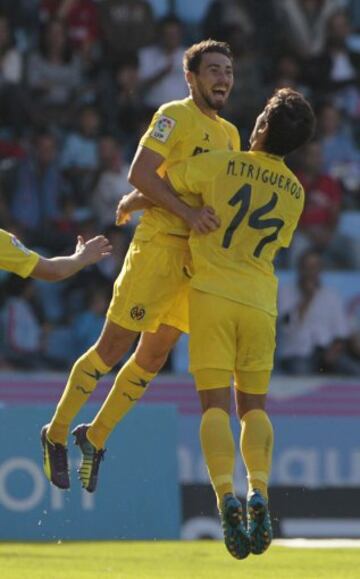 Moisés celebra el 0-2 con Trigueros.