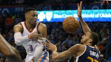 Feb 28, 2017; Oklahoma City, OK, USA; Oklahoma City Thunder guard Russell Westbrook (0) passes the ball behind Utah Jazz center Rudy Gobert (27) during the second quarter at Chesapeake Energy Arena. Mandatory Credit: Mark D. Smith-USA TODAY Sports
