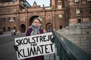 Influencer | 17-years-old Swedish climate activist Greta Thunberg holds a poster reading "School strike for Climate" as she protests in front of the Swedish Parliament.