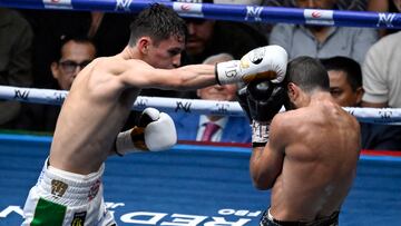 Mexican David Picasso (L) fights Armenian Azat Hovhannisyan fight during their WBC Super Bantamweight Silver Voluntary boxing fight AT The Arena Ciudad de Mexico in Mexico City on AuguGUST 24, 2024. (Photo by ALFREDO ESTRELLA / AFP)