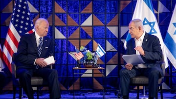 FILE PHOTO: U.S. President Joe Biden, left, meets with Israeli Prime Minister Benjamin Netanyahu, right, to discuss the ongoing conflict between Israel and Hamas, in Tel Aviv, Israel, Wednesday, Oct. 18, 2023. Miriam Alster/Pool via REUTERS/File Photo