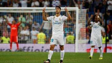 Marco Asensio celebra su segundo gol al Valencia que supuso el empate y que materializó de falta directa.