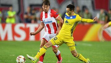 Bate&#039;s midfielder Mirko Ivanic (L) vies with Crvena Zvezda&#039;s defender Filip Stojkovic during the UEFA Europa League match between FK Crvena Zvezda Beograd and Bate Borisov at the Rajko Mitic stadium in Belgrade on September 14, 2017.   / AFP PHOTO / ANDREJ ISAKOVIC