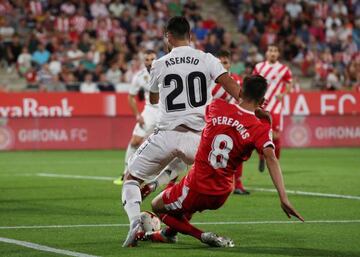 Second pen | Real Madrid's Marco Asensio brought down by Girona's Pere Pons.