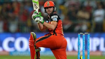 Royal Challengers Bangalore batsman AB de Villiers plays a shot during the first qualifiers cricket match between Royal Challengers Bangalore and Gujarat Lions at The M. Chinnaswamy Stadium in Bangalore on May 24, 2016.
  Royal Challengers are chasing a t