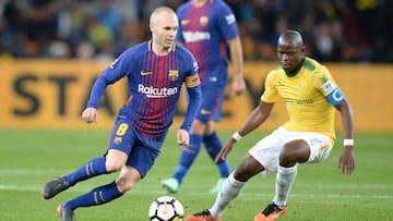 JOHANNESBURG, SOUTH AFRICA - MAY 16:   Andres Iniesta of Barcelona FC and Hlompho Kekana of Mamelodi Sundowns during the  International Club Friendly match between Mamelodi Sundowns and Barcelona FC at FNB Stadium on May 16, 2018 in Johannesburg, South Af