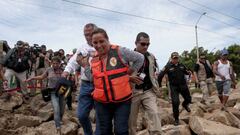 TUMBES, PERU - MARCH 11: Peruvian President Dina Boluarte (C) visits areas affected by cyclone and delivers humanitarian aid goods to the region in Tumbes, Peru on March 11, 2023. (Photo by Klebher Vasquez/Anadolu Agency via Getty Images)