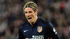 Atletico Madrid's forward Fernando Torres celebrates after scoring a goal during the Spanish league football match Athletic Club vs Atletico de Madrid at the San Mames stadium in Bilbao on April 20, 2016