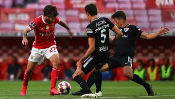 Lisbon (Portugal), 23/06/2020.- Benfica's Rafa (L) in action against Santa Clara players Joao Afonso (C) and Rafael Ramos (R) during the Portuguese First League soccer match between Benfica Lisbon and Santa Clara at Luz stadium in Lisbon, Portugal, 2