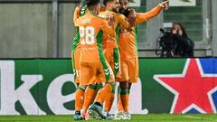 Real Betis' French midfielder Nabil Fekir (R) celebrates with teammates after scoring his team's first goal during the UEFA Europa League Group C football match between Ludogorets Razgrad (BUL) and  Real Betis (ESP) at The Ludogorets Arena in Razgrad on October 27, 2022. (Photo by Anton Uzunov / AFP)