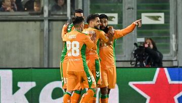 Real Betis' French midfielder Nabil Fekir (R) celebrates with teammates after scoring his team's first goal during the UEFA Europa League Group C football match between Ludogorets Razgrad (BUL) and  Real Betis (ESP) at The Ludogorets Arena in Razgrad on October 27, 2022. (Photo by Anton Uzunov / AFP)