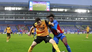 LONDON, ENGLAND - JANUARY 30: Maximilian Kilman of Wolverhampton Wanderers is challenged by Eberechi Eze of Crystal Palace during the Premier League match between Crystal Palace and Wolverhampton Wanderers at Selhurst Park on January 30, 2021 in London, E