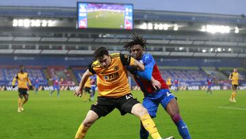 LONDON, ENGLAND - JANUARY 30: Maximilian Kilman of Wolverhampton Wanderers is challenged by Eberechi Eze of Crystal Palace during the Premier League match between Crystal Palace and Wolverhampton Wanderers at Selhurst Park on January 30, 2021 in London, E