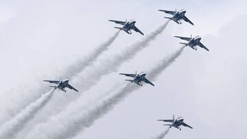 The Japan Air Self-Defense Force's Blue Impulse aerobatic team flies over Miyako island in Okinawa Prefecture, southern Japan, on Dec. 11, 2022, marking the 50th anniversary of an ASDF base on the island. (Photo by Kyodo News via Getty Images)