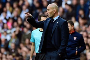 Real Madrid's French coach Zinedine Zidane during the Spanish league football match between Real Madrid and Sevilla at the Santiago Bernabeu Stadium in Madrid on December 9, 2017.