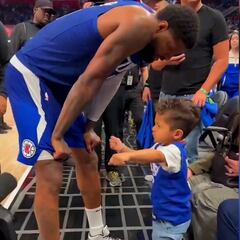 Adorable moment: Paul George celebrates Clippers win with his son