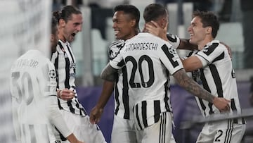 Juventus' Federico Chiesa, right, celebrates with teammates after scoring his side's opening goal during the Champions League group H soccer match between Juventus and Chelsea at the Allianz stadium in Turin, Italy, Wednesday, Sept. 29, 2021. (A