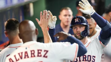 Apr 19, 2025; Houston, Texas, USA; Houston Astros first baseman Christian Walker (8) celebrates his two run home run with teammates against the San Diego Padres in the sixth inning at Daikin Park. Mandatory Credit: Thomas Shea-Imagn Images