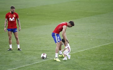 Sergio Ramos looks on as son Sergio Jr nutmegs Morata.