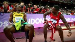 Bolt y Justin Gatlin charlan tras disputar los 200 m.