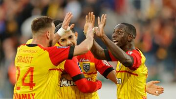 Soccer Football - Ligue 1 - RC Lens v Nantes - Stade Bollaert-Delelis, Lens, France - February 19, 2023 RC Lens' Deiver Machado celebrates scoring their first goal with Jonathan Gradit REUTERS/Pascal Rossignol