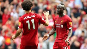 England Premier League - Liverpool vs Newcastle United
 
 14 September 2019, England, Liverpool: Liverpool&#039;s Sadio Mane (R) celebrates with his teammate Mohamed Salah scoring his side&#039;s second goal during the English Premier League soccer match 