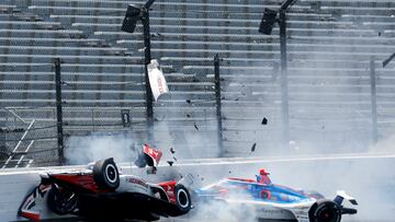 May 22, 2023; Speedway, Indiana, USA;Rahal Letterman Lanigan Racing driver Katherine Legge (44) and Dreyer & Reinbold Racing driver Stefan Wilson (24) crash in the first turn Monday, May 22, 2023, during practice ahead of the 107th running of the Indianapolis 500 at Indianapolis Motor Speedway. Mandatory Credit: John Chilton-USA TODAY Sports