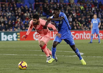 Luis Suárez y Djené.