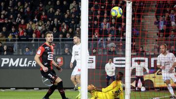 Marseille's Kevin Strootman, second left, scores his side's opening goal during the League One soccer match between Rennes and Marseille, at the Roazhon Park stadium in Rennes, France, Friday, Jan. 10, 2020. (AP Photo/David Vincent)
