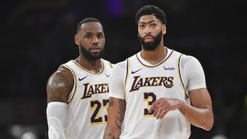 LeBron James #23 and Anthony Davis #3 of the Los Angeles Lakers while playing the Phoenix Suns at Staples Center on January 1, 2020 in Los Angeles, California.