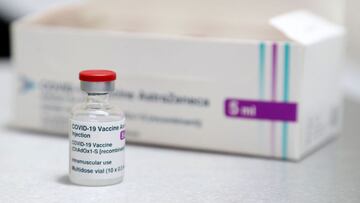 (FILES) In this file photo taken on January 4, 2021 a box of AstraZeneca/Oxford Covid-19 vaccine vials are pictured at the Pontcae Medical Practice in Merthyr Tydfil in south Wales. - Delayed second and third doses of the AstraZeneca vaccine boost immunity against Covid-19, a study by Oxford University, which developed the jab with the British-Swedish firm, said on Monday, June 28. Giving a third dose of the jab more than six months after the second dose also leads to a "substantial increase" in antibodies and induces a "strong boost" to subjects' immune response, said the pre-print study, meaning that it has yet to be peer-reviewed. (Photo by Geoff Caddick / AFP)