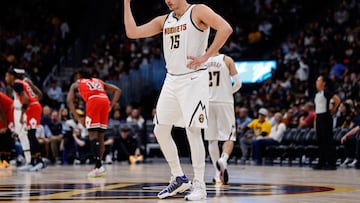 Oct 15, 2023; Denver, Colorado, USA; Denver Nuggets center Nikola Jokic (15) gestures to the bench in the second quarter against the Chicago Bulls at Ball Arena. Mandatory Credit: Isaiah J. Downing-USA TODAY Sports