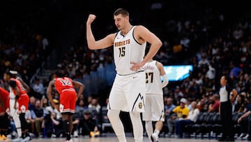 Oct 15, 2023; Denver, Colorado, USA; Denver Nuggets center Nikola Jokic (15) gestures to the bench in the second quarter against the Chicago Bulls at Ball Arena. Mandatory Credit: Isaiah J. Downing-USA TODAY Sports