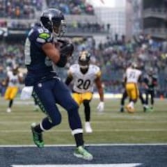 Cinco touchdowns de Wilson deciden un duelo de ida y vuelta