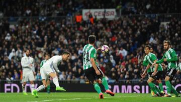 MADRID, SPAIN - MARCH 12: Cristiano Ronaldo of Real Madrid scores Real's opening goal during the La Liga match between Real Madrid CF and Real Betis Balompie at Estadio Santiago Bernabeu on March 12, 2017 in Madrid, Spain.