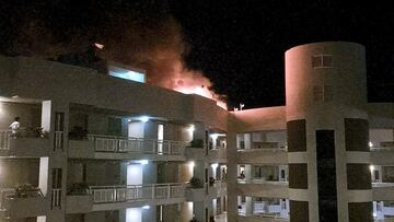 A fire burns at the Double Tree Hotel after a helicopter crashed into the roof in Cairns, Australia, August 12, 2024, in this still image taken from social media video. Amanda Kay/via REUTERS THIS IMAGE HAS BEEN SUPPLIED BY A THIRD PARTY. MANDATORY CREDIT. NO RESALES. NO ARCHIVES.