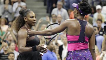 Serena Williams meets her sister Venus Williams at net after her straight sets victory in the 3rd round in Arthur Ashe Stadium at the 2018 US Open Tennis Championships at the USTA Billie Jean King National Tennis Center in New York City on August 31, 2018