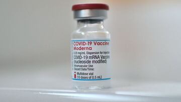A picture taken on June, 4, 2021, shows a vial of the Moderna Covid-19 vaccine at a pharmacy in Paris. - Doses of Modernax92s Covid-19 vaccine are now available in pharmacies in France from May 28, 2021. (Photo by STEPHANE DE SAKUTIN / AFP)