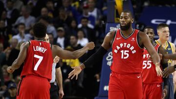 OAKLAND, CA - DECEMBER 12: Greg Monroe #15 of the Toronto Raptors is congratulated by Kyle Lowry #7 after he was fouled by the Golden State Warriors at ORACLE Arena on December 12, 2018 in Oakland, California. NOTE TO USER: User expressly acknowledges and agrees that, by downloading and or using this photograph, User is consenting to the terms and conditions of the Getty Images License Agreement.   Ezra Shaw/Getty Images/AFP
 == FOR NEWSPAPERS, INTERNET, TELCOS &amp; TELEVISION USE ONLY ==