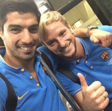 Luis Suárez con Rakitic.