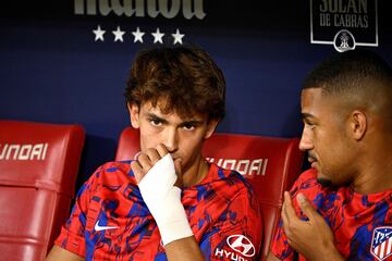 Atletico Madrid's Portuguese forward #18 Joao Felix (L) looks on prior the Spanish Liga football match between Club Atletico de Madrid and Granada FC at the Wanda Metropolitano stadium in Madrid on August 14, 2023. (Photo by JAVIER SORIANO / AFP)