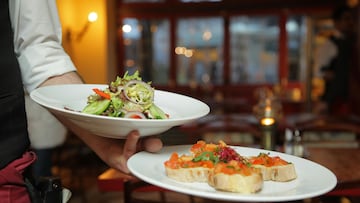Helping a waiter to clean a table may be more than just a simple act of kindness.