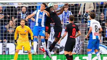 Espanyol's Colombian defender Bernardo Espinosa (2L) vies with Atletico Madrid's Brazilian defender Felipe (3L) and Atletico Madrid's Ghanaian midfielder Thomas Partey during the Spanish League football match between Espanyol and Atletico M