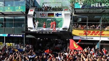 MELBOURNE, AUSTRALIA - MARCH 25:  Race winner Sebastian Vettel of Germany and Ferrari, second placed Lewis Hamilton of Great Britain and Mercedes GP and third placed Kimi Raikkonen of Finland and Ferrari celebrate on the podium during the Australian Formula One Grand Prix at Albert Park on March 25, 2018 in Melbourne, Australia.  (Photo by Mark Thompson/Getty Images)