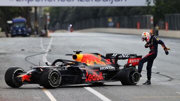 BAKU, AZERBAIJAN - JUNE 06:Max Verstappen of Netherlands and Red Bull Racing kicks his tyre as he reacts after crashing during the F1 Grand Prix of Azerbaijan at Baku City Circuit on June 06, 2021 in Baku, Azerbaijan. (Photo by Clive Rose/Getty Images)