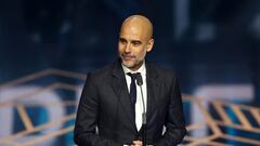 Soccer Football - The Best FIFA Football Awards - Eventim Apollo, London, Britain - January 15, 2024  Manchester City manager Pep Guardiola on stage after winning the best men's coach of 2023 during the awards ceremony REUTERS/Andrew Boyers